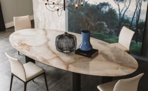 Roll Keramik table de Cattelan Italia, signée Paolo Cattelan, allie innovation, élégance et équilibre grâce à sa base cylindrique sculpturale et son plateau en céramique Marmi raffiné. Disponible chez D-Style Interior.
