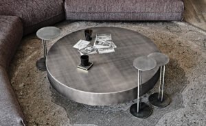Table basse design haut de gamme Arena par Cattelan Italia, finition brossée main avec plateaux verre pivotants, disponible chez D-Style Interior.