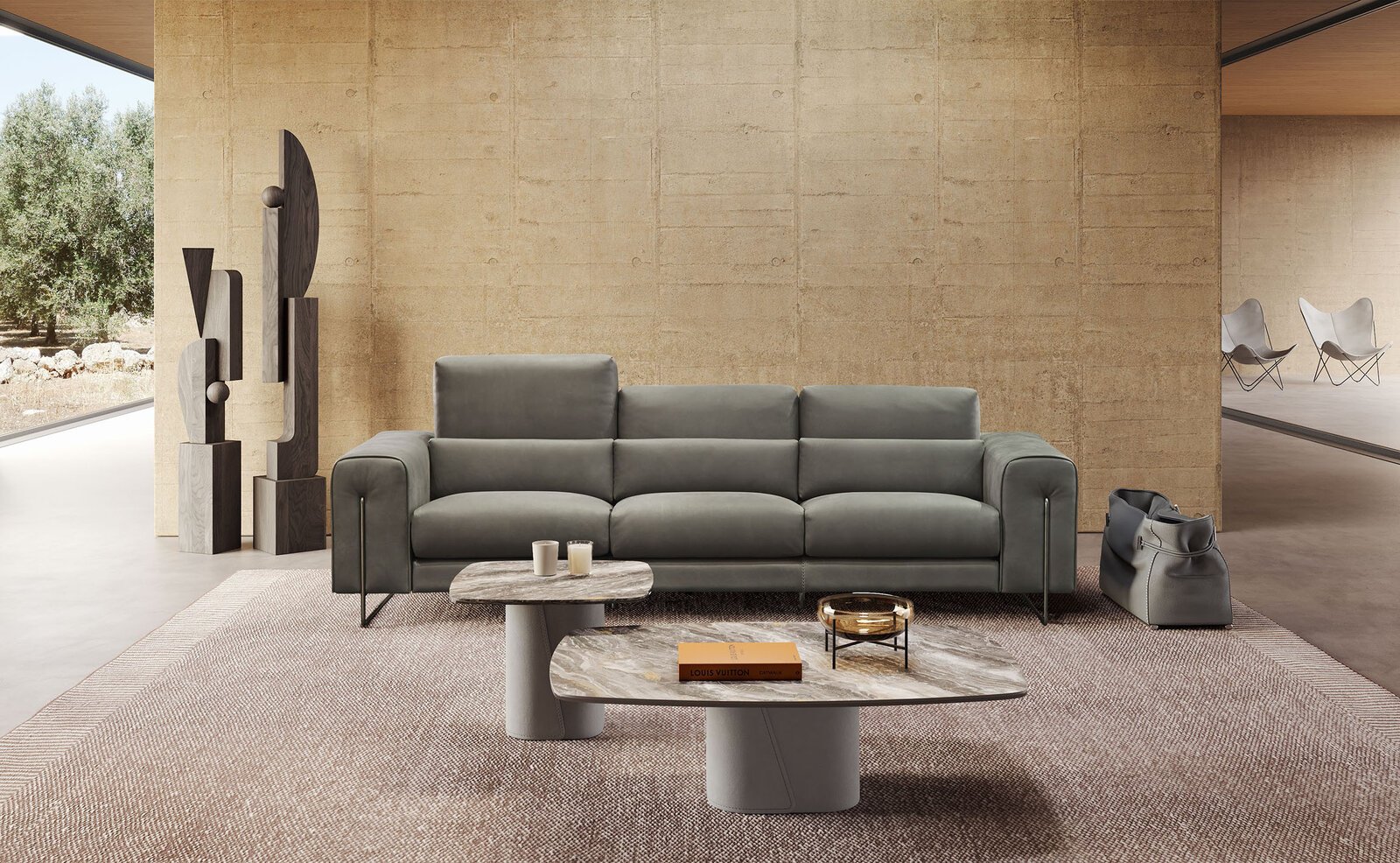 Block table basse de Gamma Arredamenti, un modèle haut de gamme en cuir avec plateau en verre, céramique ou marbre. Élégance italienne chez D-Style Interior.